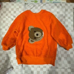 Oversized women’s Cozy Orange Bear Sweater